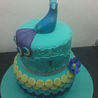 Peacock cake and cupcakes