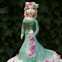 lady in green dress and flowers