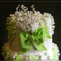 Wedding cake with lilies of the valley