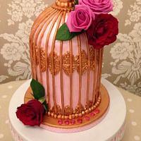 Golden vintage birdcage with Roses 