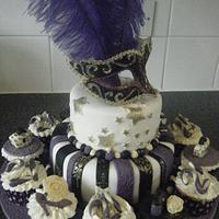 masquerade and feathers cake