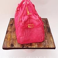 Pink alligator skin handbag 