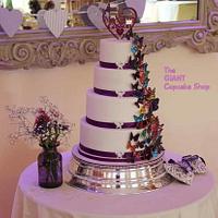 Multi coloured butterfly wedding cake