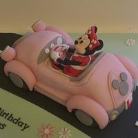 Minnie Mouse in her car cake 