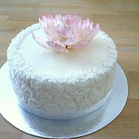Small wedding cake with sugar flower