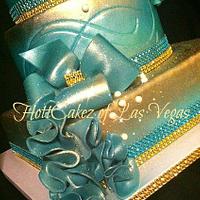 Tiffany blue with gold and bling