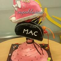 A whimsical fashion themed cake.