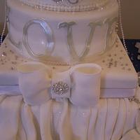 the big silver and white wedding cake