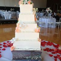 PEACHY WHITE WEDDING CAKE