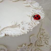 Lace cake with ladybug