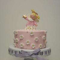 Blossom cake with an Angel topper