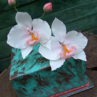 Orchids, turquoise and rust