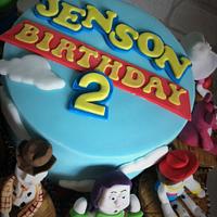 Toy Story cake with character cupcakes