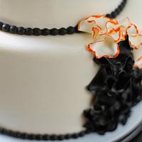 Orange and Black ruffle cake