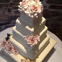 Ivory and dusky pink rose wedding cake with dog and cat