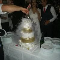 Gold white dry ice wedding cake