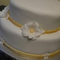 White and gold birthday cake 
