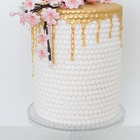 Double Barrel Gold Drip & White Pearl Cake