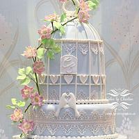 Birdcage, lace and briar rose wedding cake