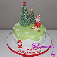 Christmas cake, a sweet happy child