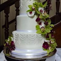 White Pearl Drape & Fresh Orchid Wedding Cake :) x