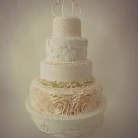 Ivory ruffle wedding cake