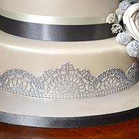 Silver and lace wedding cake