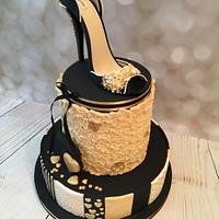Black cream and beige shoe cake