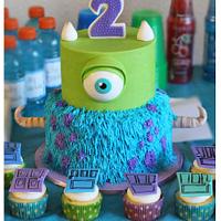 Monsters Inc cake and cupcakes