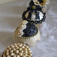 Elegant black and gold cupcakes