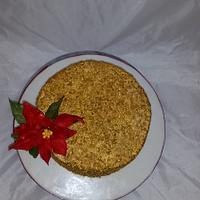 Gold sequin Christmas cake with poinsetta 