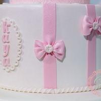 Girl christening cake and cupcakes