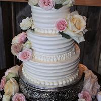 Buttercream wedding cake fresh flowers