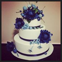 Blue sugar flower wedding cake