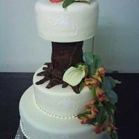 wedding cake with tree and flowers