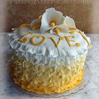Yellow ombre ruffle cake with Cala lillies