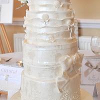 Satin gown wedding cake