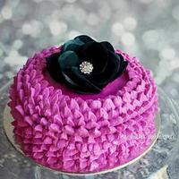 A pretty lotus cake with wafer paper rose
