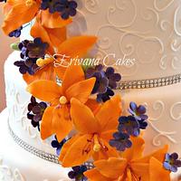 Wedding Cake with orange and purple gumpaste flowers